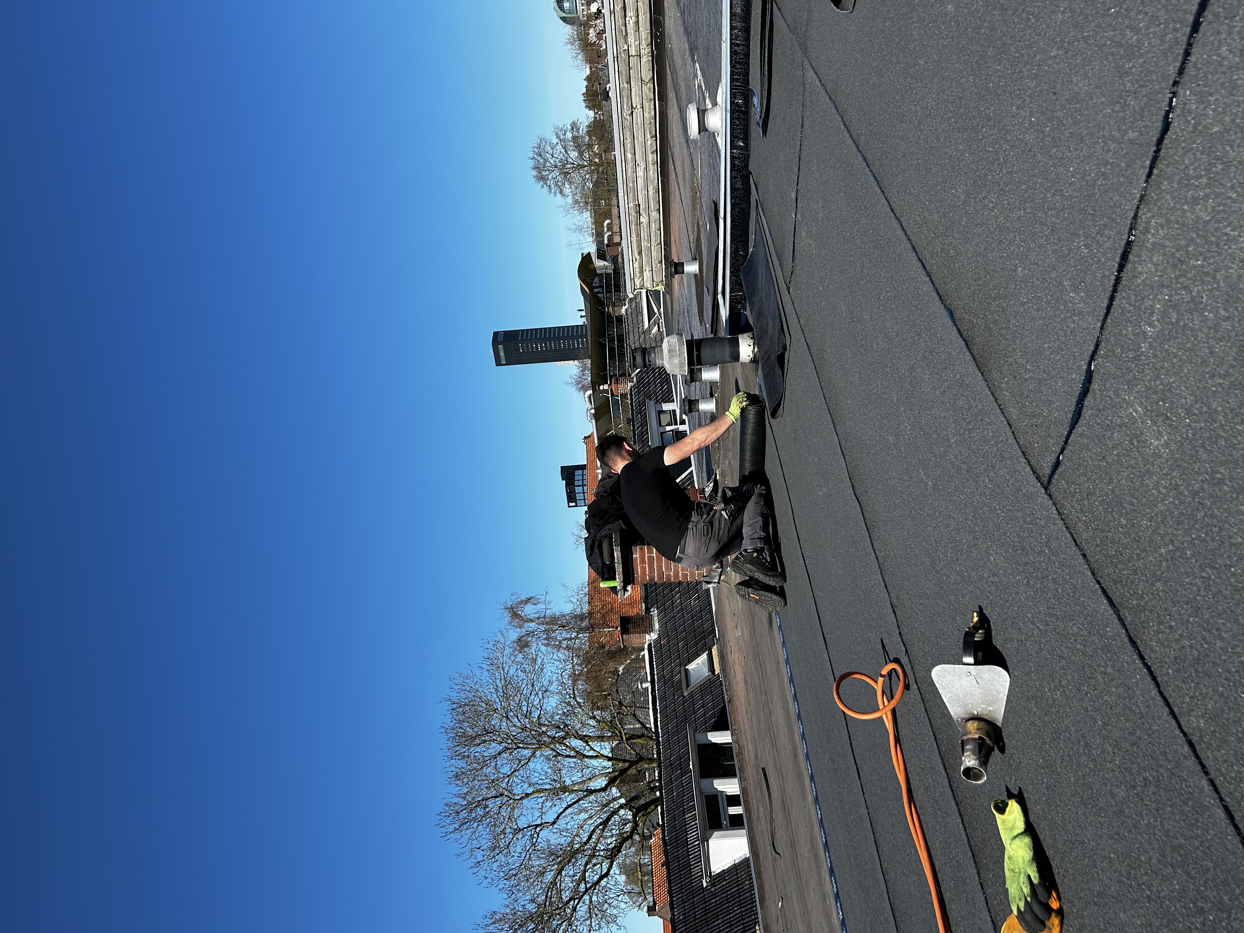 Plat dak renoveren